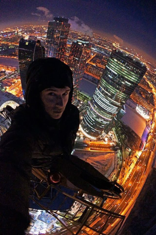 Illustration for article titled The craziest Russian climber is back with more gonad-shriveling photos